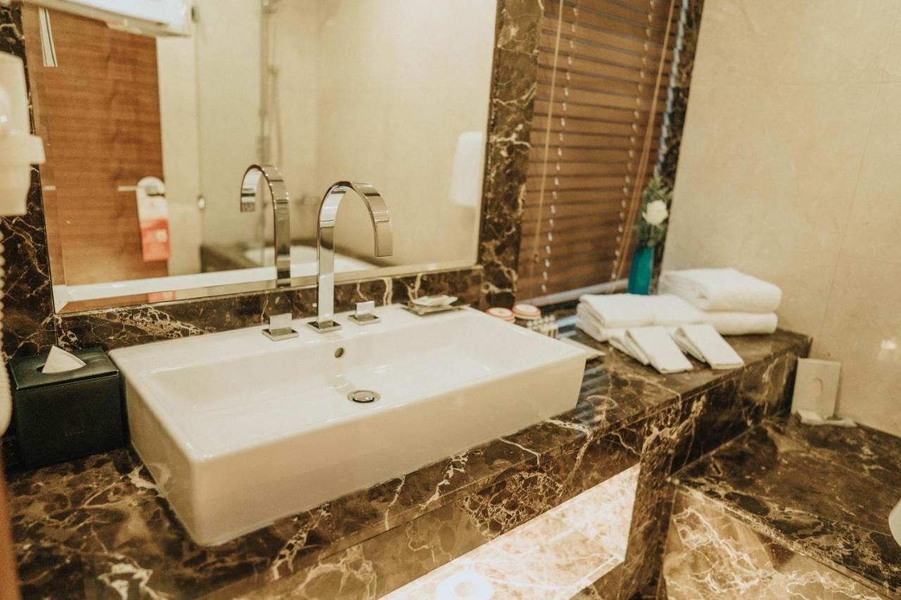 Grand Millennium Sulaimani Hotel Sulaymaniyah Exterior photo Bathroom