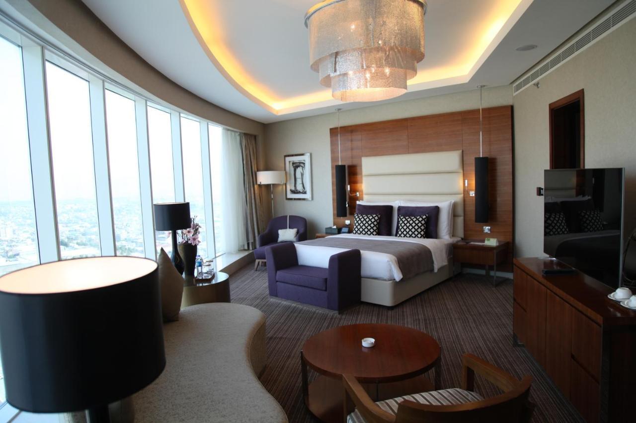 Grand Millennium Sulaimani Hotel Sulaymaniyah Exterior photo A bedroom at the hotel