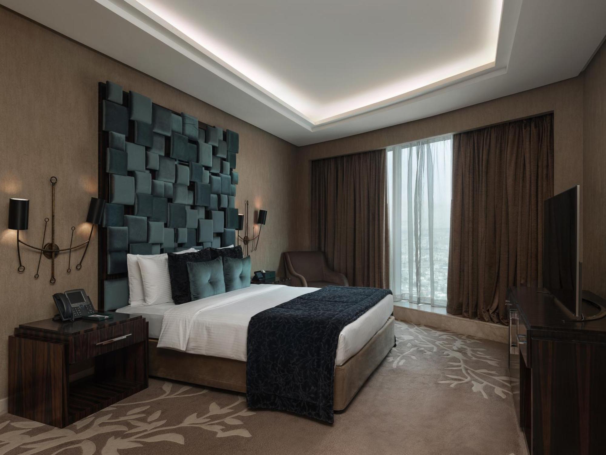 Grand Millennium Sulaimani Hotel Sulaymaniyah Exterior photo A bedroom at the hotel